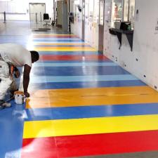 Aesthetic-Multi-color-Epoxy-Floor-Staging-Area-in-a-Warehouse 0